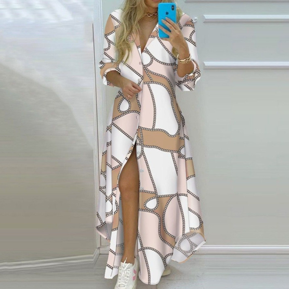 Antonia - Luxe Zomerjurk met Artistieke Kranten Print